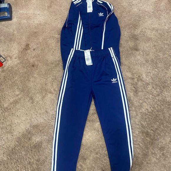 Brand new Youth Adidas matching sweatsuit.